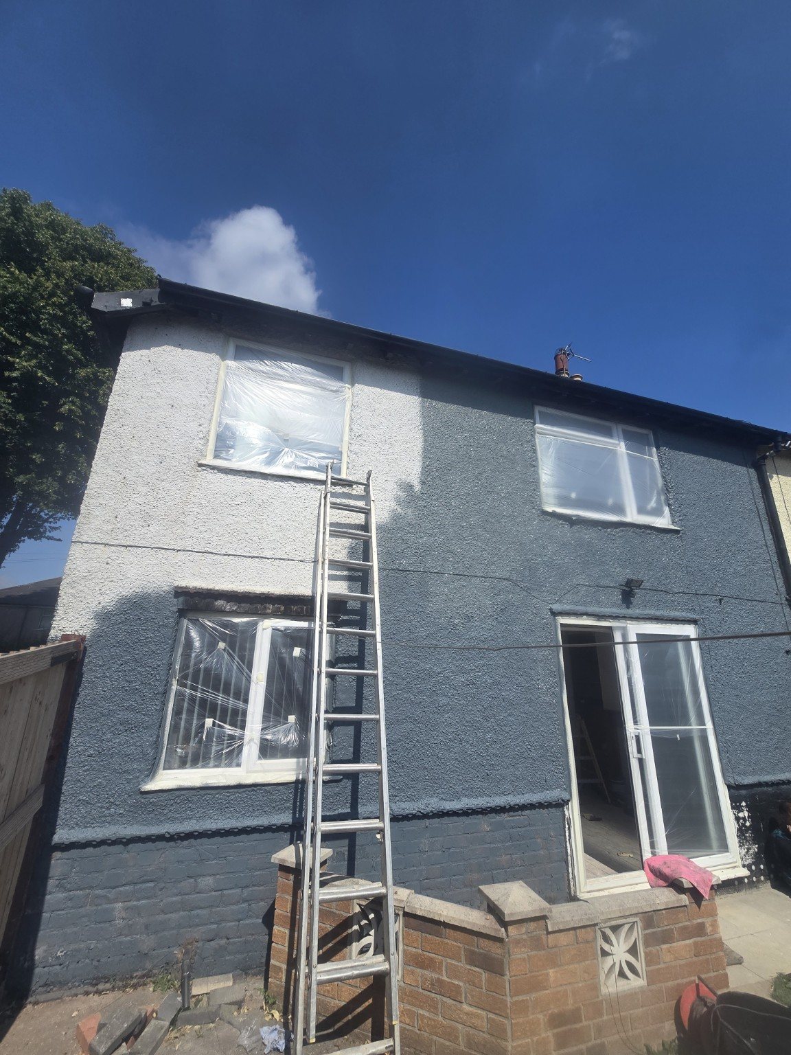 Exterior wall painting in progress